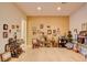 Bright living room with wood floors, decorated with art, trophies, and furniture, adding character and charm at 3008 Astoria Pines Cir, Las Vegas, NV 89107