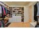 Walk-in closet with custom shelving and storage at 3008 Astoria Pines Cir, Las Vegas, NV 89107