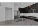 Modern kitchen features stainless steel appliances, dark cabinets, and granite countertops at 5589 Pico Ferrera Ct, Las Vegas, NV 89113