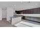 Modern kitchen features stainless appliances, granite countertops, and a large island at 5589 Pico Ferrera Ct, Las Vegas, NV 89113