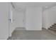Bright living room with neutral carpet and ample natural light at 5589 Pico Ferrera Ct, Las Vegas, NV 89113