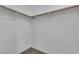 Walk-in closet offers functional layout with rods and shelving for organized storage at 5589 Pico Ferrera Ct, Las Vegas, NV 89113