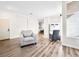 Bright living room boasts wood floors, fresh paint, and modern decor at 8276 Aurora Peak Ave, Las Vegas, NV 89131
