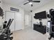 Spacious workout room with mounted television and weights at 8276 Aurora Peak Ave, Las Vegas, NV 89131