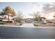 Beautifully landscaped home with a well-maintained front yard and an inviting entrance at 9 Knob Oak Dr, Henderson, NV 89052