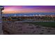 Picturesque cityscape view at sunset with vibrant colors painting the sky overlooking a golf course at 9213 Las Manaitas Ave # 401, Las Vegas, NV 89144