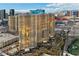 Beautiful high rise with elegant architecture, lovely manicured landscaping, and a sparkling blue pool for luxury living at 135 E Harmon Ave # 3320, Las Vegas, NV 89109