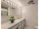 Bright bathroom featuring a single sink vanity and standard toilet at 205 E Harmon Ave # 803, Las Vegas, NV 89169