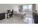 Modern bedroom with tile floors, a large window with a view, and neutral decor at 205 E Harmon Ave # 803, Las Vegas, NV 89169