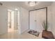 Bright entryway boasting tiled floors, a modern light fixture, and entry to a bathroom at 205 E Harmon Ave # 803, Las Vegas, NV 89169