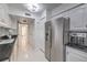 Well-lit kitchen with white cabinets, stainless steel appliances, and functional design at 205 E Harmon Ave # 803, Las Vegas, NV 89169