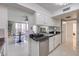 Cozy kitchen next to the open living and dining area, with granite countertop and stainless appliances at 205 E Harmon Ave # 803, Las Vegas, NV 89169