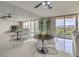 Bright living room featuring tile floors, mirrored wall, and a dining area with city views at 205 E Harmon Ave # 803, Las Vegas, NV 89169