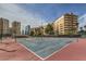 Well-maintained tennis courts with surrounding buildings at 205 E Harmon Ave # 803, Las Vegas, NV 89169