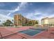 Condo community tennis courts on a sunny day, showing the buildings at 205 E Harmon Ave # 803, Las Vegas, NV 89169