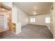 Open living area with vaulted ceiling, soft neutral tones and carpet at 254 Reber Dr, Mesquite, NV 89027