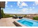 Relaxing hot tub on the property with comfortable seating and breathtaking city views at 387 Solitude Peak Ln, Henderson, NV 89012