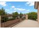 This serene balcony boasts a picturesque view with a neutral color scheme at 6045 Riverwalk Falls St # 102, North Las Vegas, NV 89031