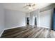 Spacious bedroom with modern flooring and ample natural light at 6045 Riverwalk Falls St # 102, North Las Vegas, NV 89031