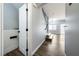 Hallway with stairs and view of living room at 6045 Riverwalk Falls St # 102, North Las Vegas, NV 89031