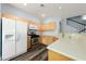 Well-equipped kitchen with stainless steel appliances and modern countertops at 6045 Riverwalk Falls St # 102, North Las Vegas, NV 89031