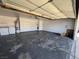 Garage featuring washer and dryer hookups, concrete flooring, and room for parking at 6361 W Viking Rd, Las Vegas, NV 89103