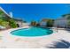 Sparkling blue pool with a spacious sun deck perfect for outdoor relaxation and entertainment at 6361 W Viking Rd, Las Vegas, NV 89103