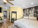 Bright bedroom features a decorative mural, natural light, and neutral tones at 8701 Giant Causeway Ave, Las Vegas, NV 89148