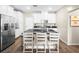 Well-appointed kitchen with stainless steel appliances, and a breakfast bar at 8701 Giant Causeway Ave, Las Vegas, NV 89148