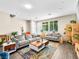 Bright living room with large windows, comfortable seating, and stylish decor at 8701 Giant Causeway Ave, Las Vegas, NV 89148
