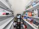 Walk-in pantry providing ample shelving to store groceries and kitchen essentials at 8701 Giant Causeway Ave, Las Vegas, NV 89148