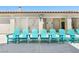 Community pool area featuring lounge chairs and an outdoor shower area and bathrooms at 8701 Giant Causeway Ave, Las Vegas, NV 89148