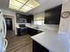 Bright kitchen features stainless steel appliances and ample counter space at 9048 Litchfield Ave, Las Vegas, NV 89134