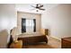 Bedroom with neutral walls, matching nightstands, and carpet flooring at 9303 Gilcrease Ave # 2178, Las Vegas, NV 89149