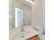 Bathroom features a single sink vanity with a large mirror at 10673 Alondra Peak St, Las Vegas, NV 89183