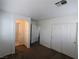 Neutral carpeted bedroom with access to a bathroom at 10673 Alondra Peak St, Las Vegas, NV 89183