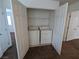 Convenient laundry closet with washer and dryer, offering practicality and ease at 10673 Alondra Peak St, Las Vegas, NV 89183