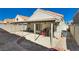 A spacious backyard with a covered patio and low-maintenance desert landscaping at 109 Clifton Heights Dr, Las Vegas, NV 89145