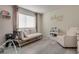 Cozy Bedroom with daybed, chair, and soft color palette at 109 Clifton Heights Dr, Las Vegas, NV 89145