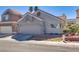 Charming single story home featuring a desert landscape and two car garage at 109 Clifton Heights Dr, Las Vegas, NV 89145