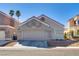Charming single story home featuring a desert landscape and two car garage at 109 Clifton Heights Dr, Las Vegas, NV 89145
