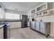 Well-lit kitchen with stainless steel appliances, light gray flooring, and ample counter space at 109 Clifton Heights Dr, Las Vegas, NV 89145
