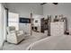 Bright main bedroom featuring an ensuite bathroom, and a comfortable seating area at 109 Clifton Heights Dr, Las Vegas, NV 89145