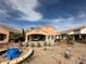 Charming single-story home with a covered patio and desert landscaping at 1210 Country Club, Laughlin, NV 89029