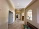Inviting hallway featuring neutral tones, tiled flooring, recessed lighting, and views into adjacent rooms at 1210 Country Club, Laughlin, NV 89029