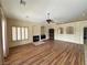Bright living room featuring wood flooring, fireplace, and arched design elements at 1210 Country Club, Laughlin, NV 89029