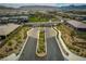 An aerial view of the Bixby Creek entrance and the surrounding neighborhood streets at 12495 Point Sierra St, Las Vegas, NV 89138