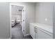 Hallway leading to bedroom with built-in storage and white cabinets at 12495 Point Sierra St, Las Vegas, NV 89138
