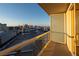 Enjoy city views from this condo balcony overlooking buildings and city skyline during the day at 125 E Harmon Ave # 2215, Las Vegas, NV 89109