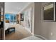 Bright bedroom with neutral colors, king bed, city views, and a convenient bar area at 125 E Harmon Ave # 2215, Las Vegas, NV 89109